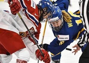 KAMLOOPS, BC - MARCH 28: Sweden's Pernilla Winberg #16 and Czech Republic's Klara Hymlarova #12 face off during preliminary round action at the 2016 IIHF Ice Hockey Women's World Championship. (Photo by Matt Zambonin/HHOF-IIHF Images)


